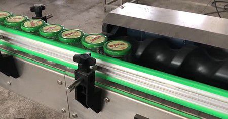Colocadora de manga para botellas